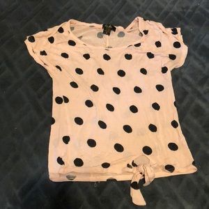 Pastel pink shirt with black polkadots